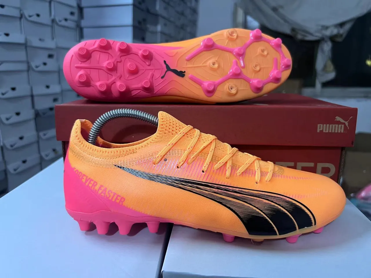 Puma Future Z Faster কমলা গোলাপি দৃঢ় মাটির ফুটবল জুতা 17