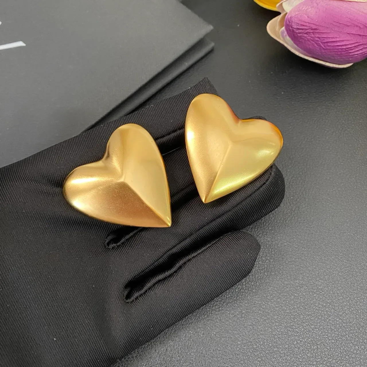 Saint Laurent Gold Sculpted Heart Metallic Earrings 6