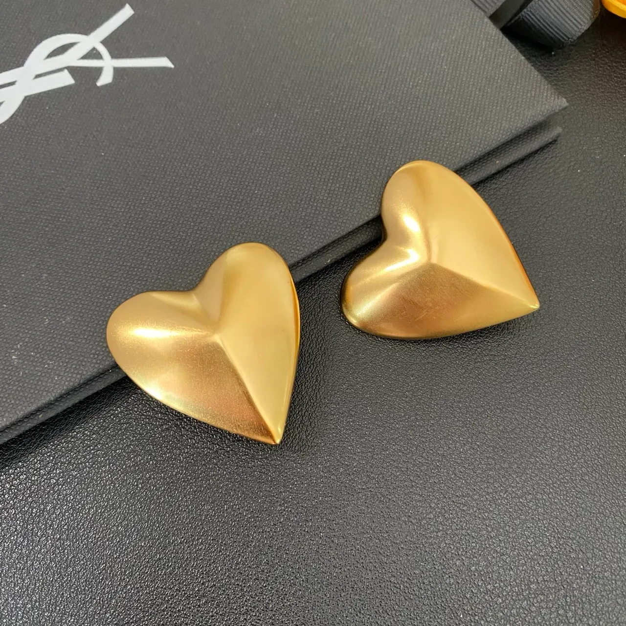 Saint Laurent Gold Sculpted Heart Metallic Earrings 8