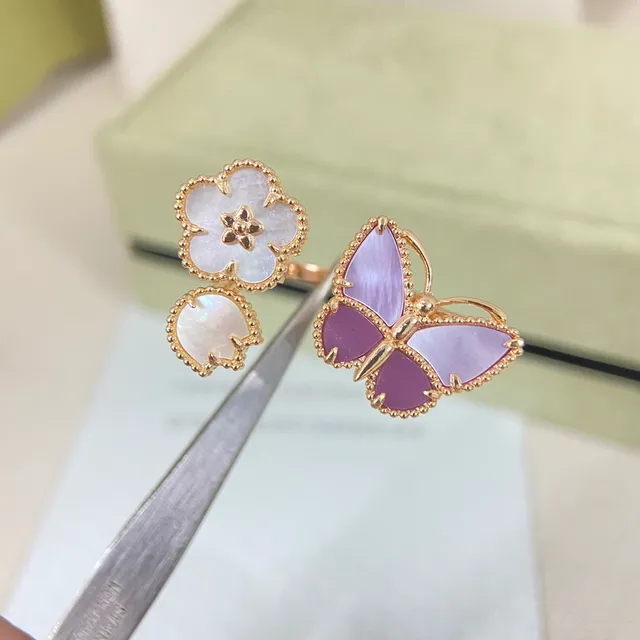 Van Cleef & Arpels Alhambra and Papillon Mother-of-Pearl Rings 4