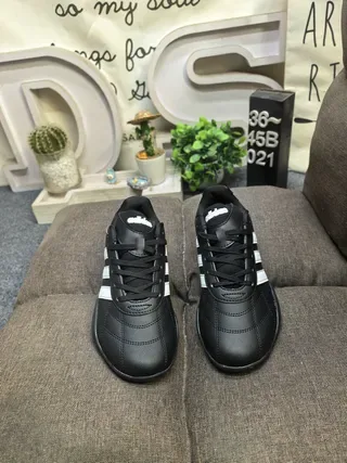 Adidas Black and White Three-Stripe Lifestyle Sneakers 10