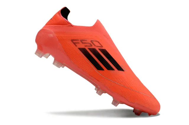 أديداس F50 برتقالي أسود أرض صلبة أحذية كرة القدم 2