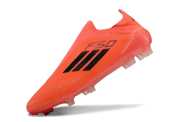 أديداس F50 برتقالي أسود أرض صلبة أحذية كرة القدم 3