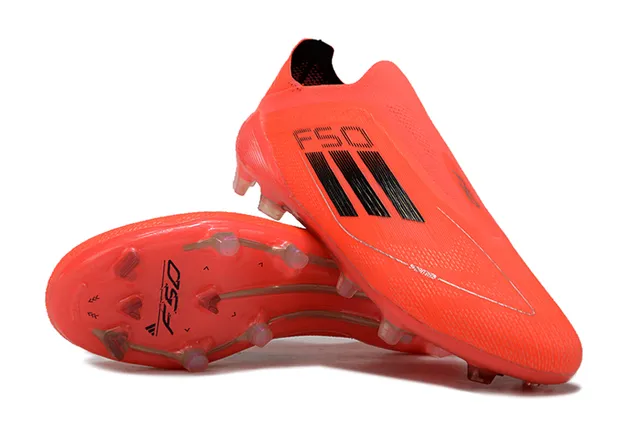 أديداس F50 برتقالي أسود أرض صلبة أحذية كرة القدم 4