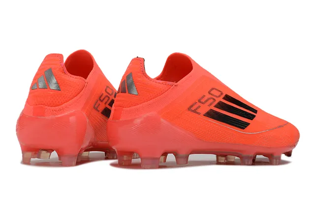 أديداس F50 برتقالي أسود أرض صلبة أحذية كرة القدم 5