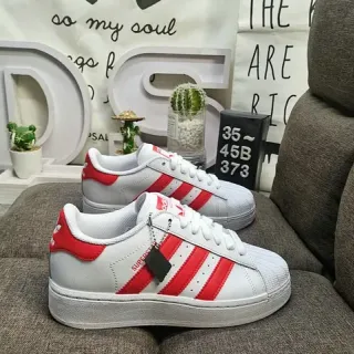 Adidas Superstar حذاء أسلوب حياة أبيض وأحمر