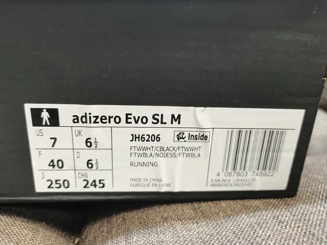 Adidas Zapatos de correr blancos y negros con tres rayas 2