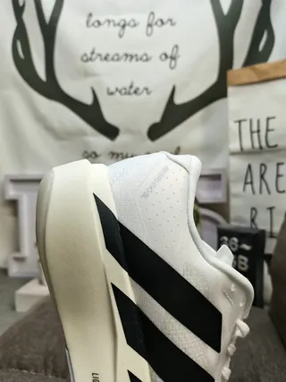 Adidas Zapatos de correr blancos y negros con tres rayas 3
