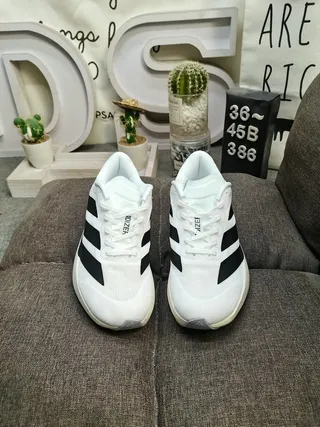 Adidas Zapatos de correr blancos y negros con tres rayas 10