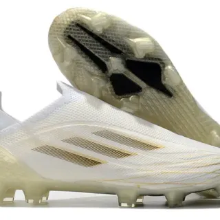 Adidas Zapatillas de fútbol blancas doradas con upper de knit y rayas metálicas para terreno firme