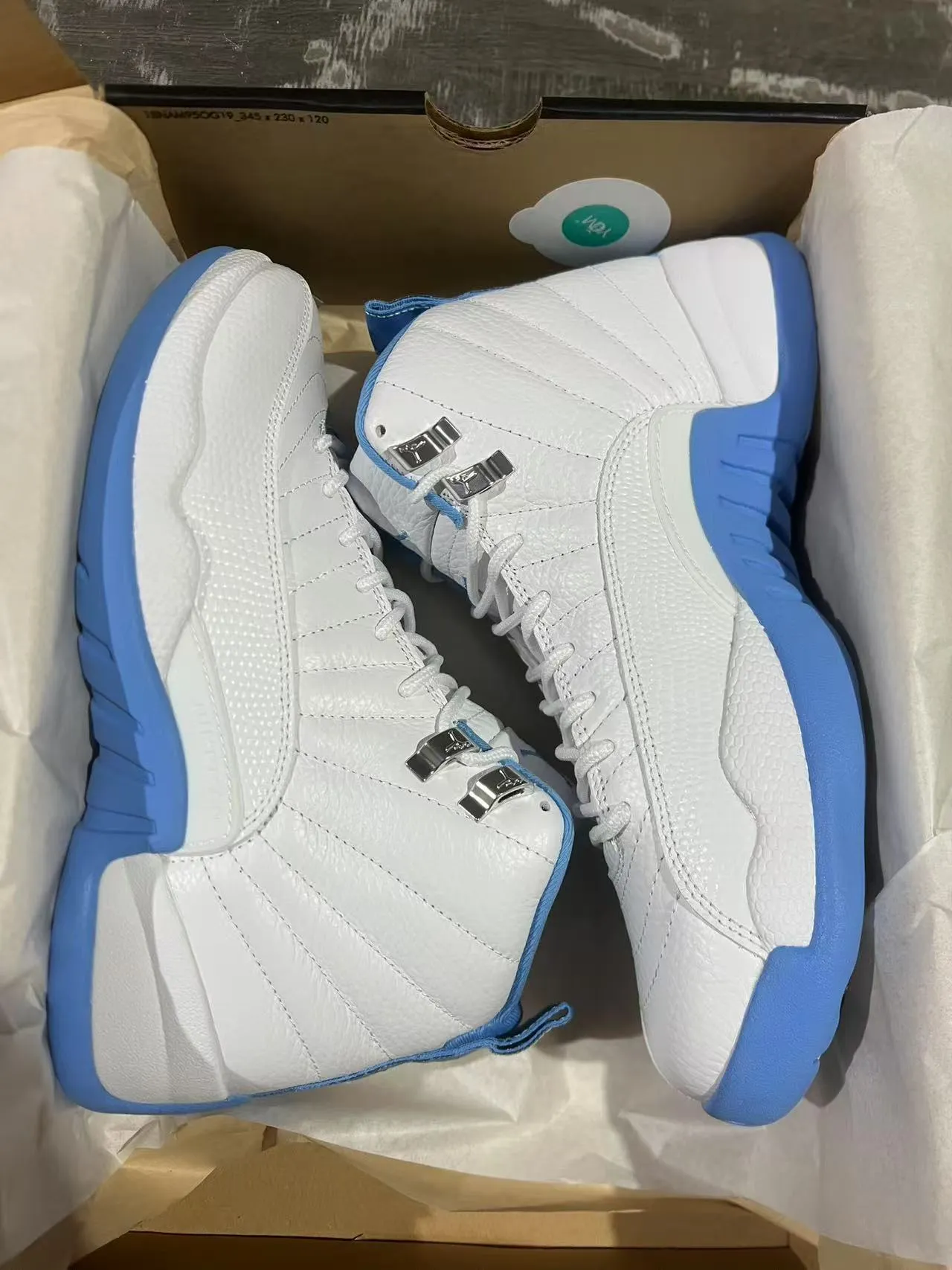 Zapatillas de baloncesto Air Jordan 12 blanco y azul 9