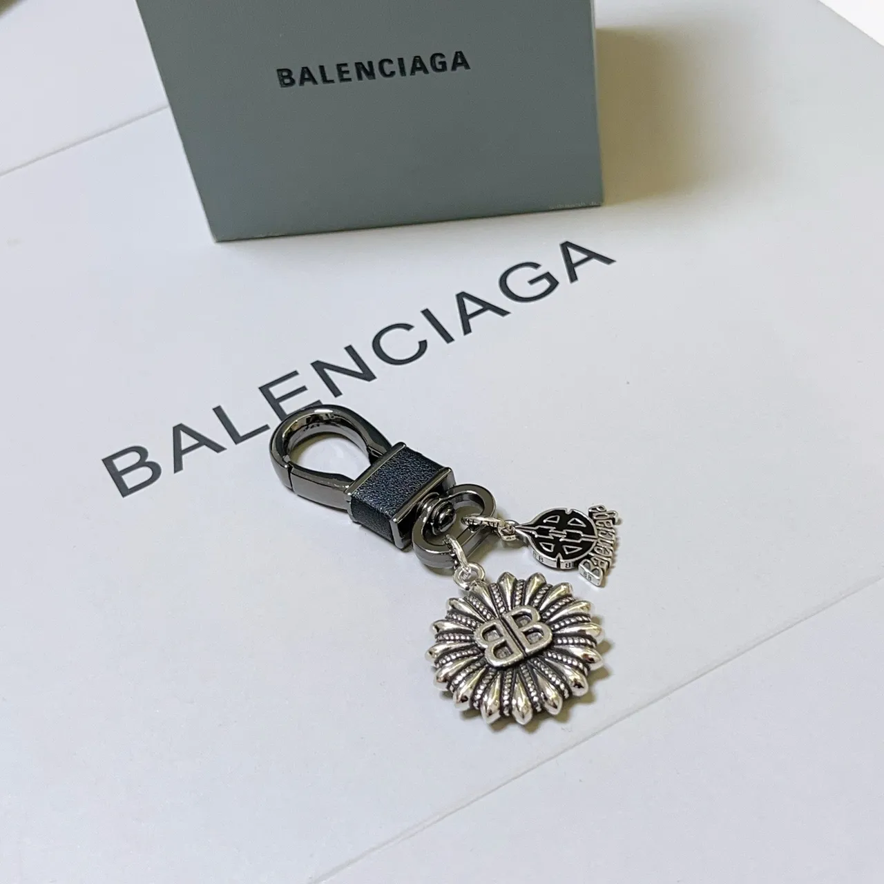 Balenciaga BB Sunburst Keychain Silver and Black Jewelry 3