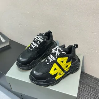 Balenciaga Triple S Black and Yellow Chunky Sneakers
