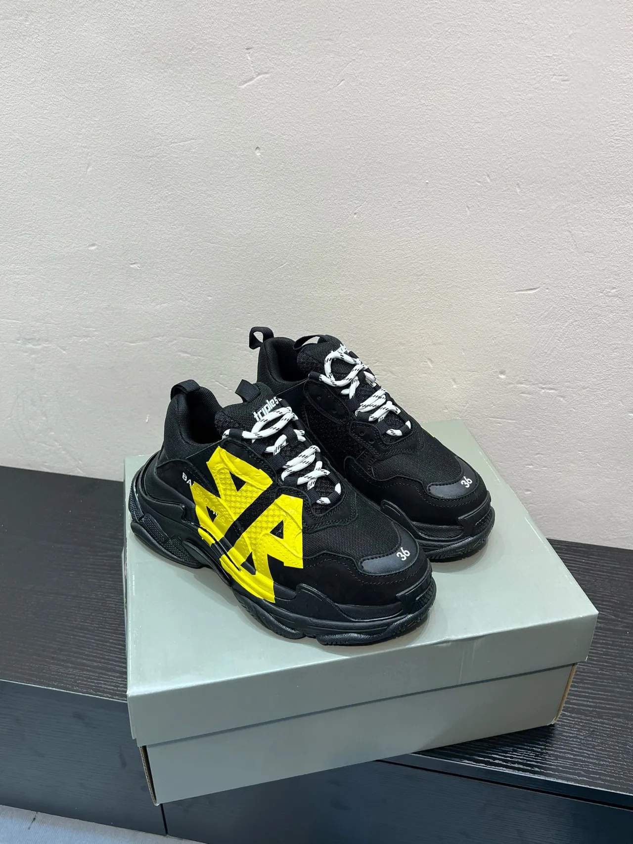 Balenciaga Triple S Black and Yellow Chunky Sneakers 4