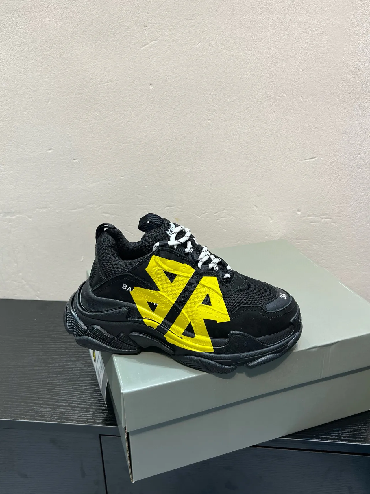 Balenciaga Triple S Black and Yellow Chunky Sneakers 8