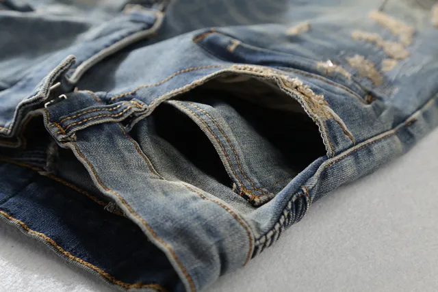 Balmain डिस्ट्रेस्ड बाइकर-स्टाइल नीली जींस 5