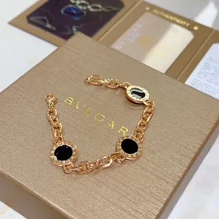 Bvlgari गोल्ड ब्लैक Curb Chain तीन Circular Motifs कंगन