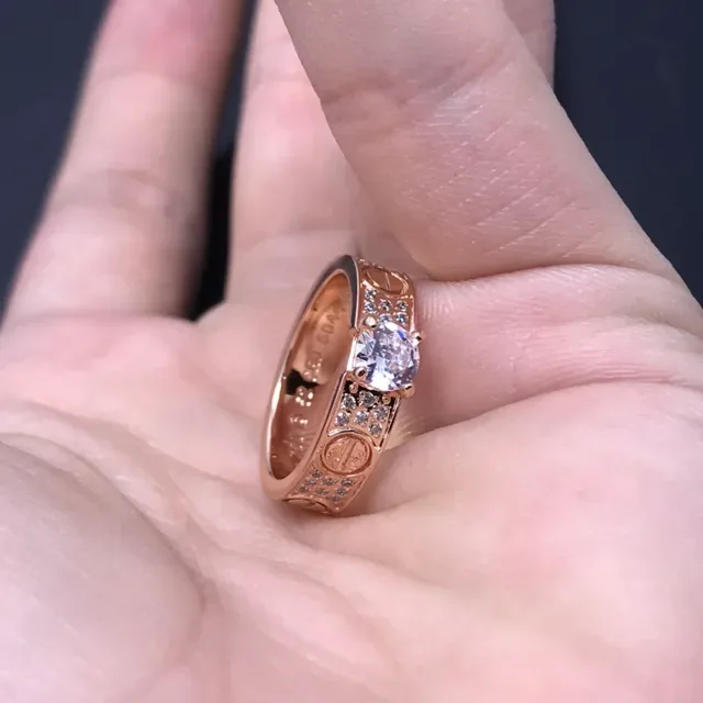 Cartier Love Ring Silver and Gold Pavé Diamond Central Stone Rings 4