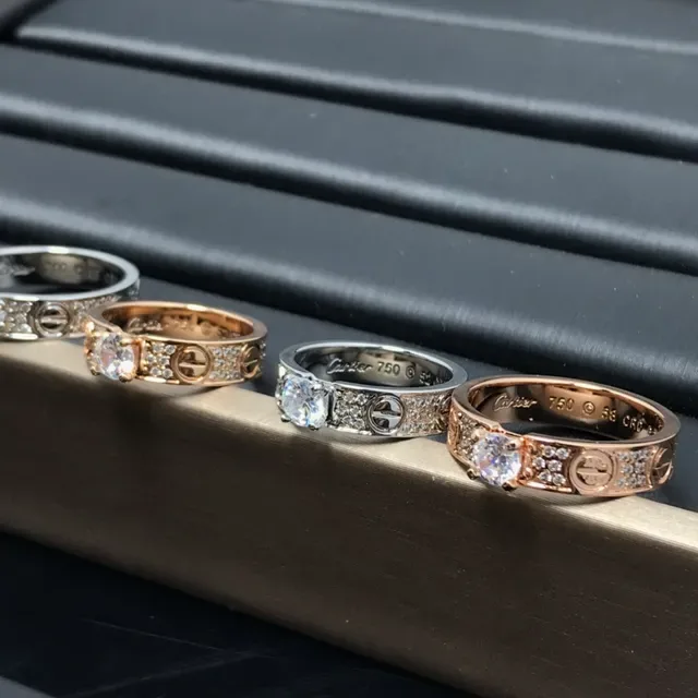 Cartier Love Ring Silver and Gold Pavé Diamond Central Stone Rings 6
