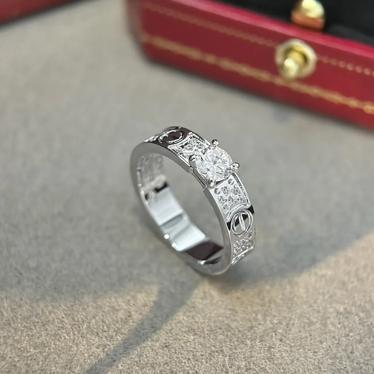Cartier Love Ring Silver and Gold Pavé Diamond Central Stone Rings 8