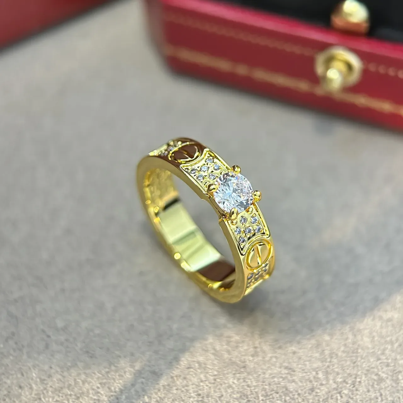Cartier Love Ring Silver and Gold Pavé Diamond Central Stone Rings 9