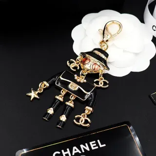 Chanel काला सोना एनामेल मूर्ति हार्डवेयर ब्रोच