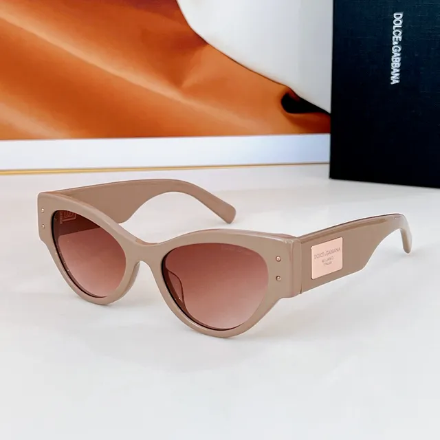 Dolce & Gabbana Lunettes de soleil noir doré silhouette chat-eye monture acétate 3