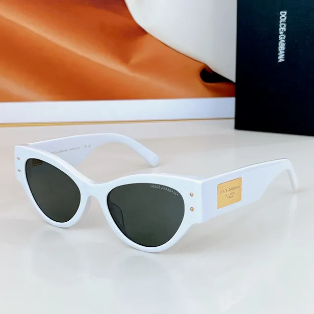 Dolce & Gabbana Lunettes de soleil noir doré silhouette chat-eye monture acétate 6