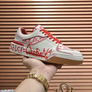 Dolce & Gabbana Sneakers Lifestyle en Cuir Imprimé Graffiti Semelle Plateforme Blanc Rouge Low-Top