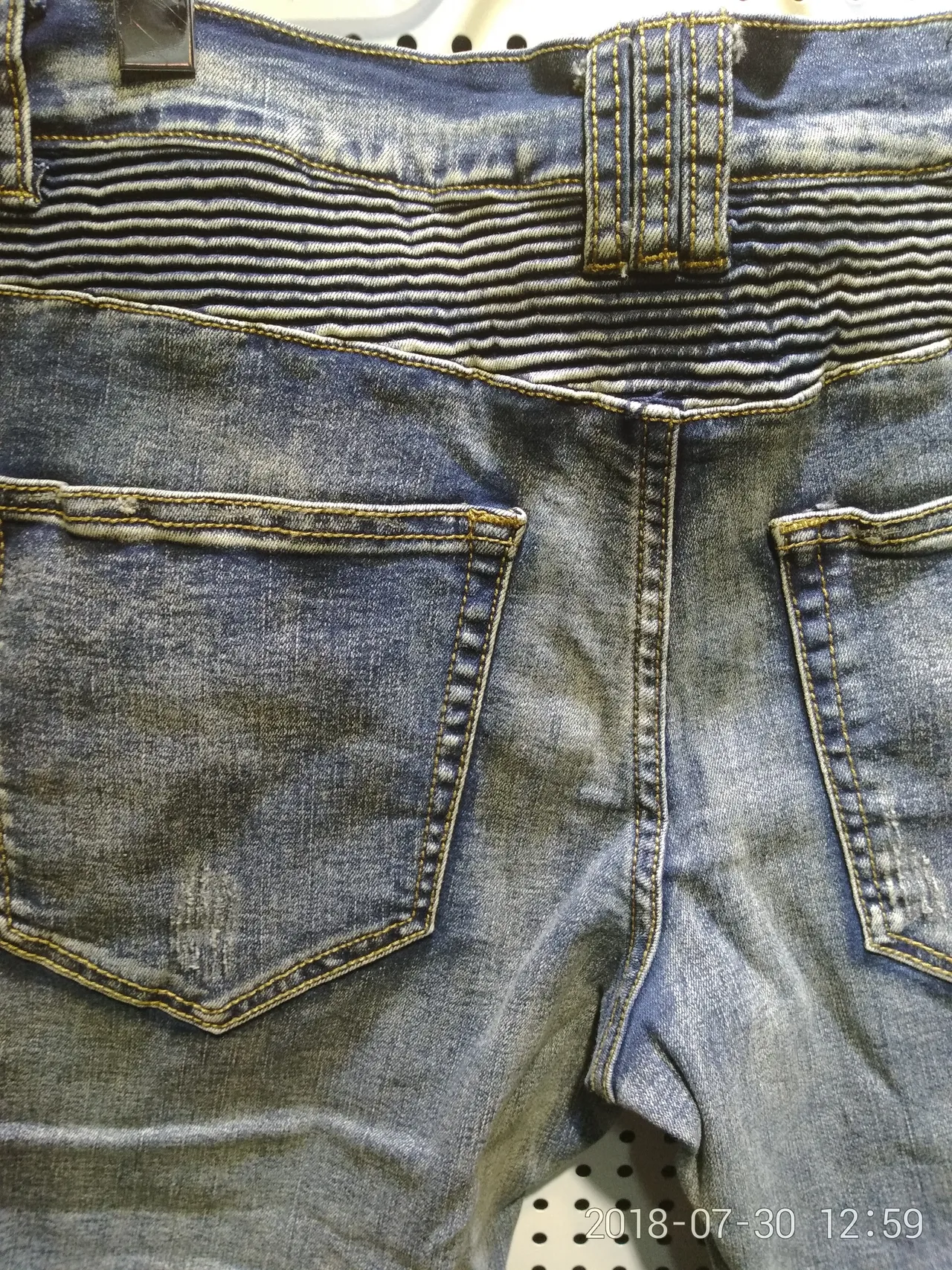 بناطل جين distressed مع جيوب أزيب وألواح موتو 4