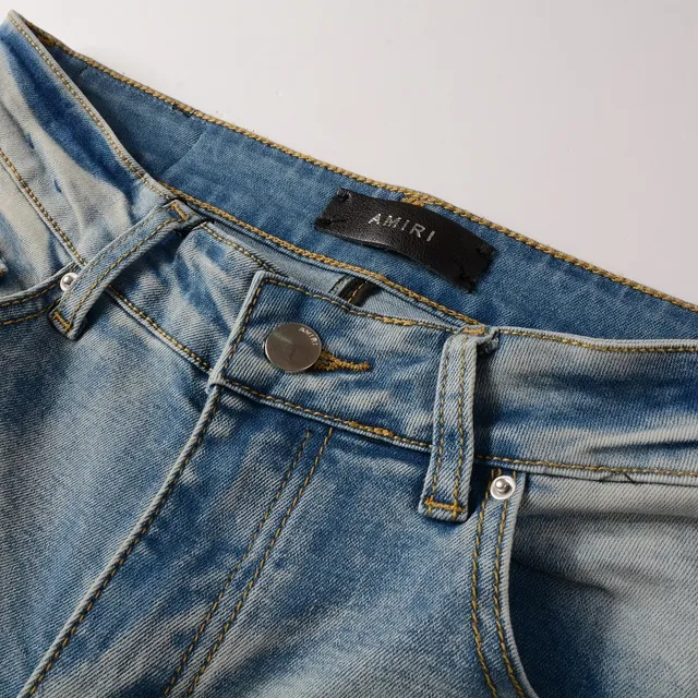 Distressed Slim-Fit Light-Wash Ripped Jeans 2