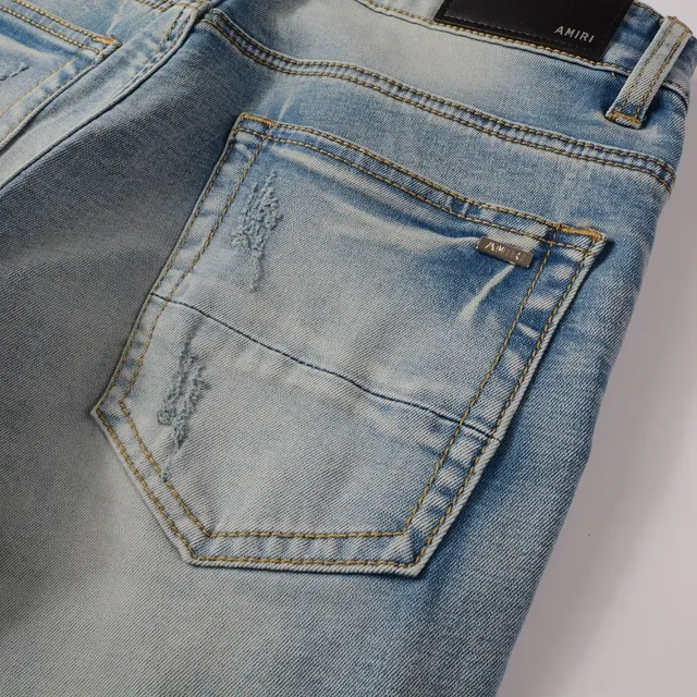 Distressed Slim-Fit Light-Wash Ripped Jeans 13