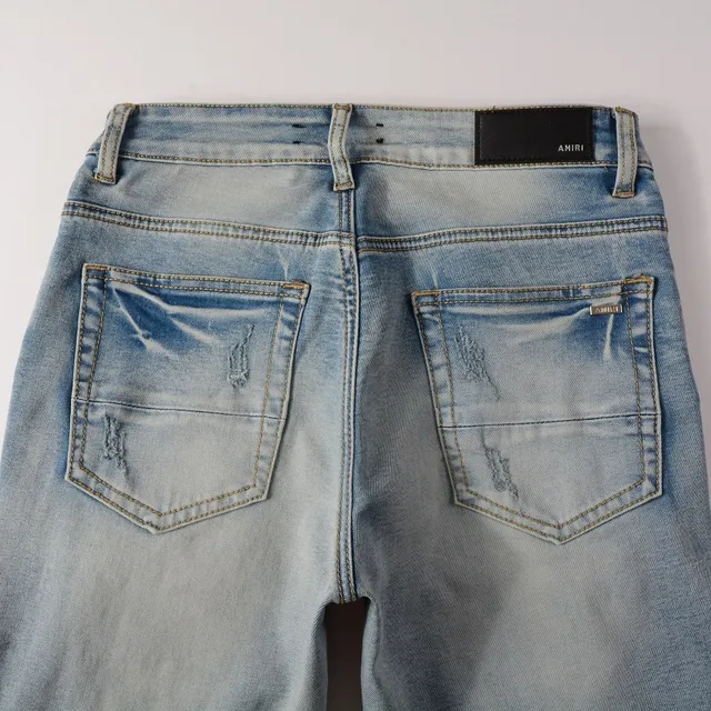 Distressed Slim-Fit Light-Wash Ripped Jeans 14