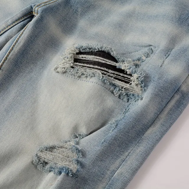 Distressed Slim-Fit Light-Wash Ripped Jeans 16