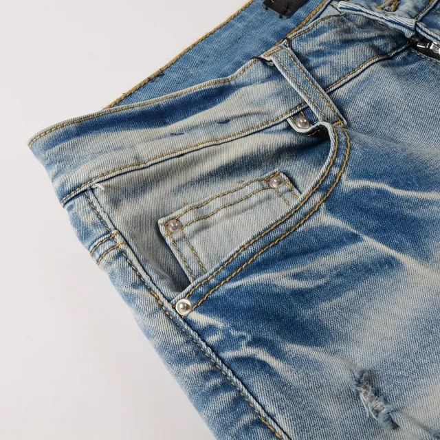 Distressed Slim-Fit Light-Wash Ripped Jeans 17
