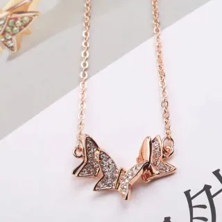 Collar de Cristal con Pavé y Doble Lazo en Tonos de Rose Gold