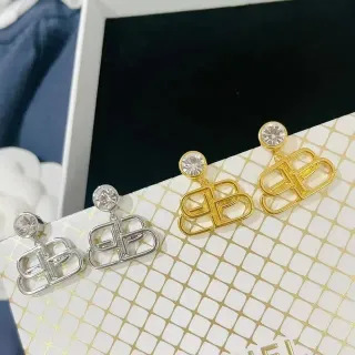 Brincos pendentes de cristal geométrico em prata e ouro