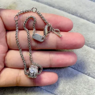 Silver-Toned Woven Chain Rotating Barrel Pendant Necklace