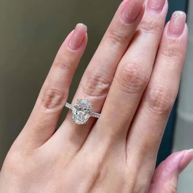 White Silver Oval-Cut Center Stone Four-Prong Setting Ring 5