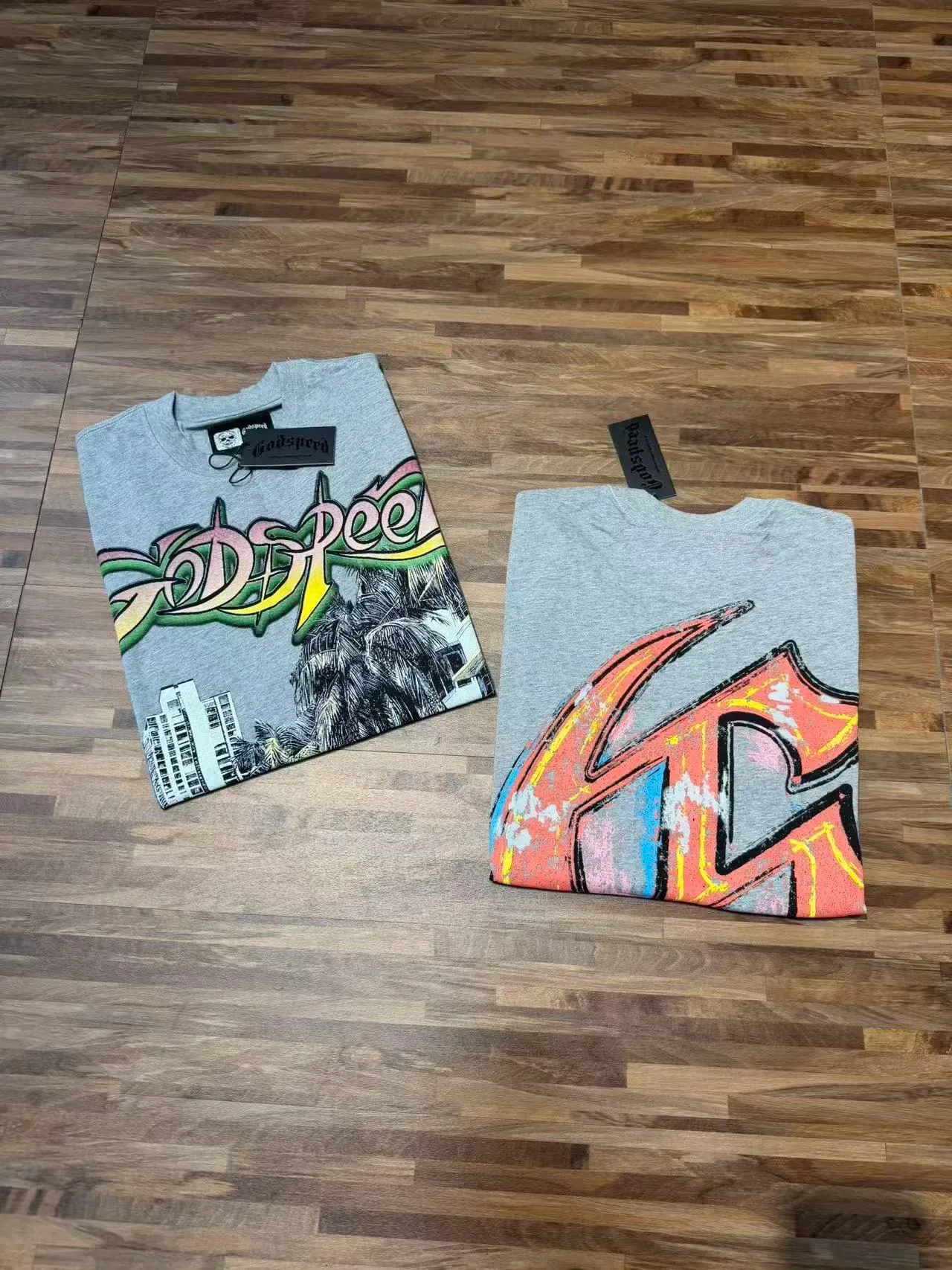 Camiseta oversized cinza mescla com estampa gráfica Godspeed 4