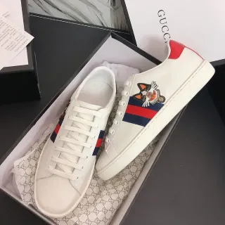 Gucci Ace zapatillas lifestyle blancas de cuero con rayas de red bordadas de gato