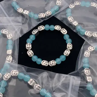 سوار جوتشي أزرق فضي خرز متشابك G شعار تعليقات