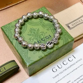 Gucci GG Marmont سوار خرز فضي منقوش