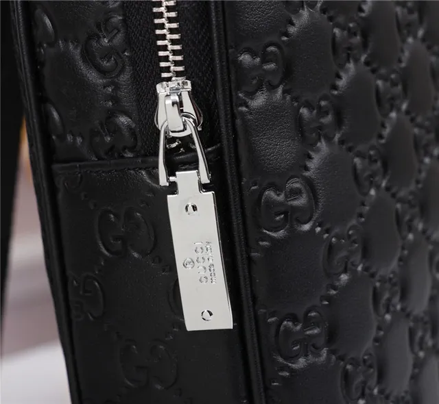 Gucci GG Supreme Bolsa crossbody preta embossed 7