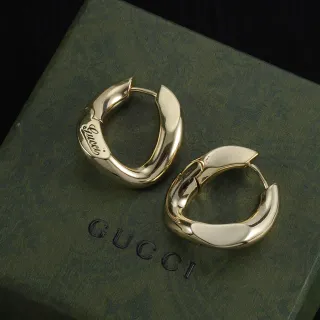 Gucci ذهبي غير متماثل منحني حلقات إغلاق مفصل أقراط