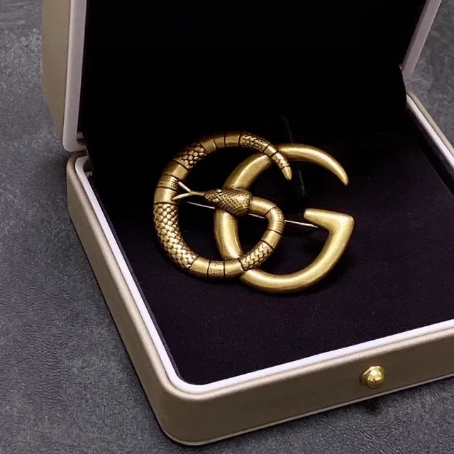 Gucci Gold Interlocking G Motif Coiled Serpent Brooch 3