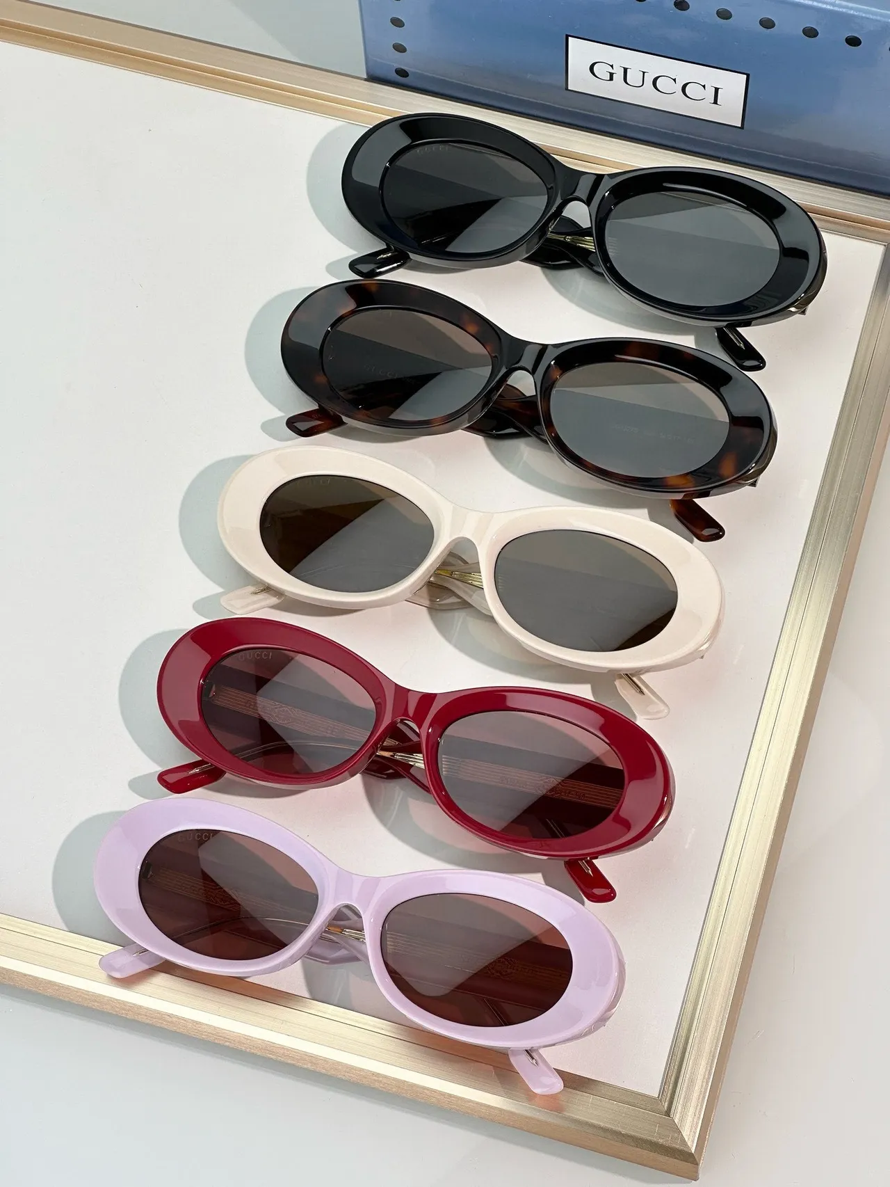 Gucci Óculos de sol Marco ovalado de acetato rosa marrom Acento de ponte dourado 4