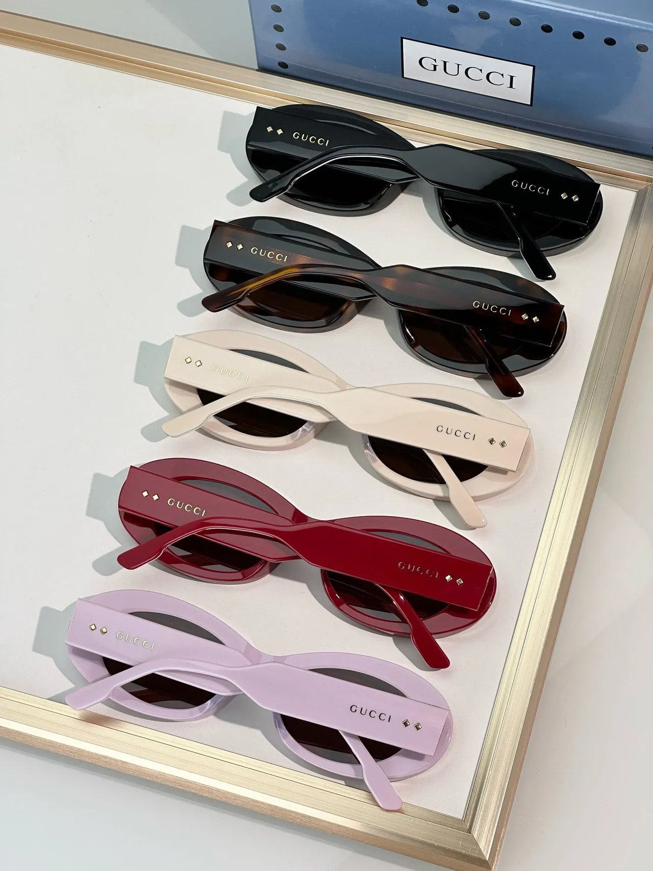 Gucci Óculos de sol Marco ovalado de acetato rosa marrom Acento de ponte dourado 5