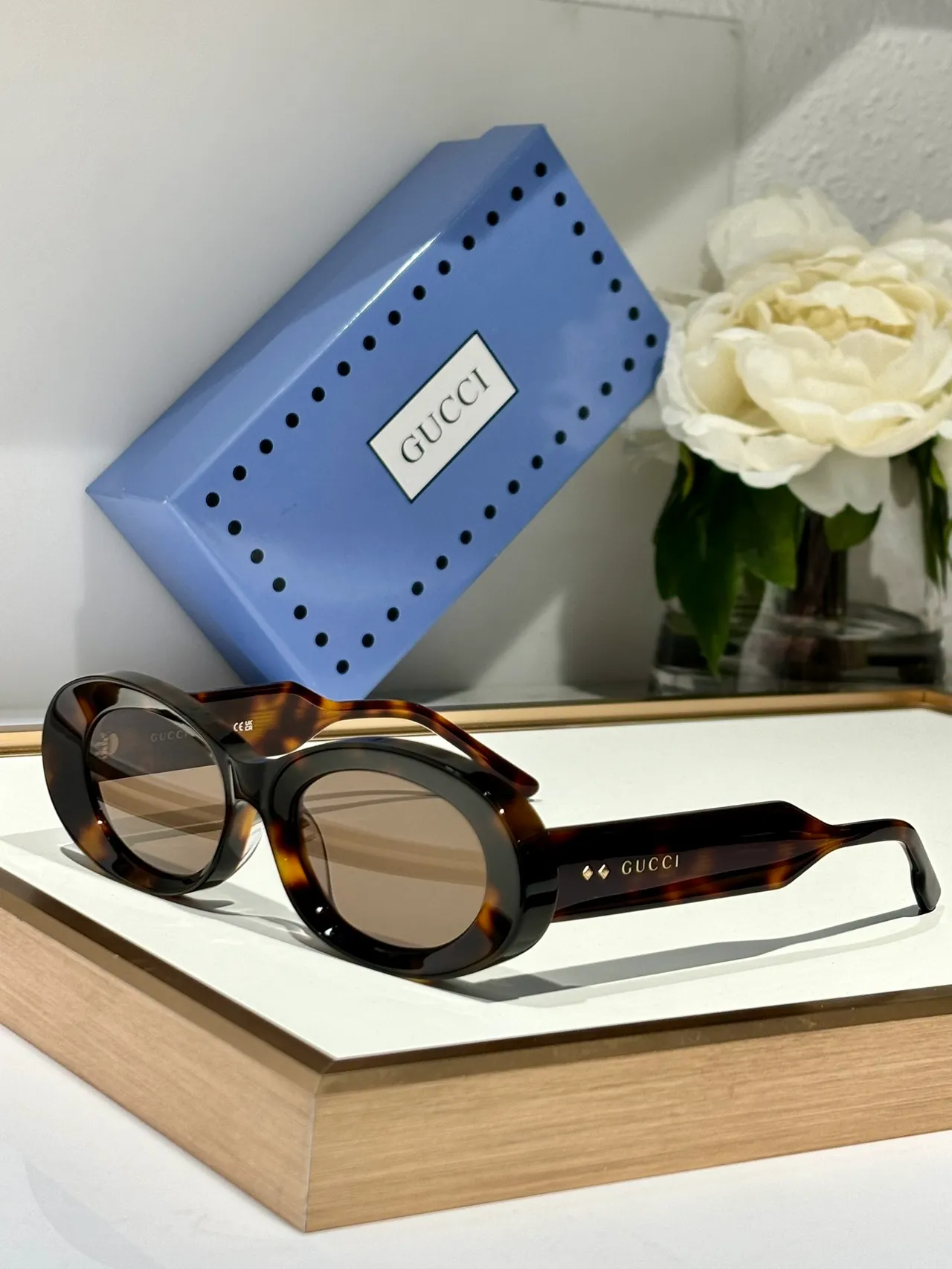 Gucci Óculos de sol Marco ovalado de acetato rosa marrom Acento de ponte dourado 7