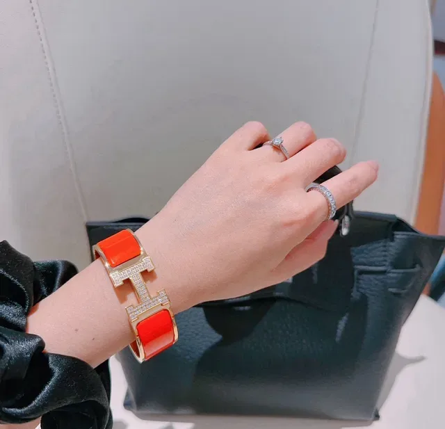 Hermès Clic H Orange Enamel Paved Crystal Gold-Tone Bracelet 2